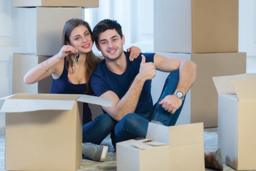Office relocation setup with labeled equipment and coordinated moving support