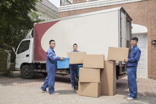 Professional house removalists preparing furniture in Westend