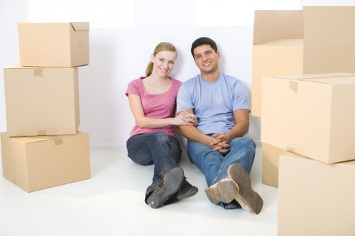 Residential moving service packing household items in Westend