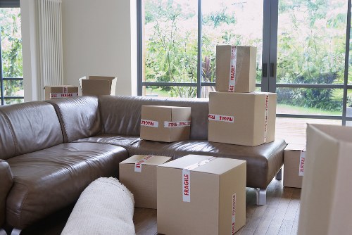 Packed storage unit in Westend with labeled boxes and furniture